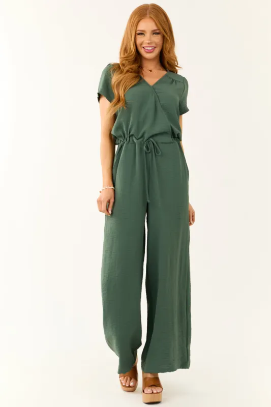 Dark Sage Surplice Wide Leg Crinkle Jumpsuit sold by Lime Lush