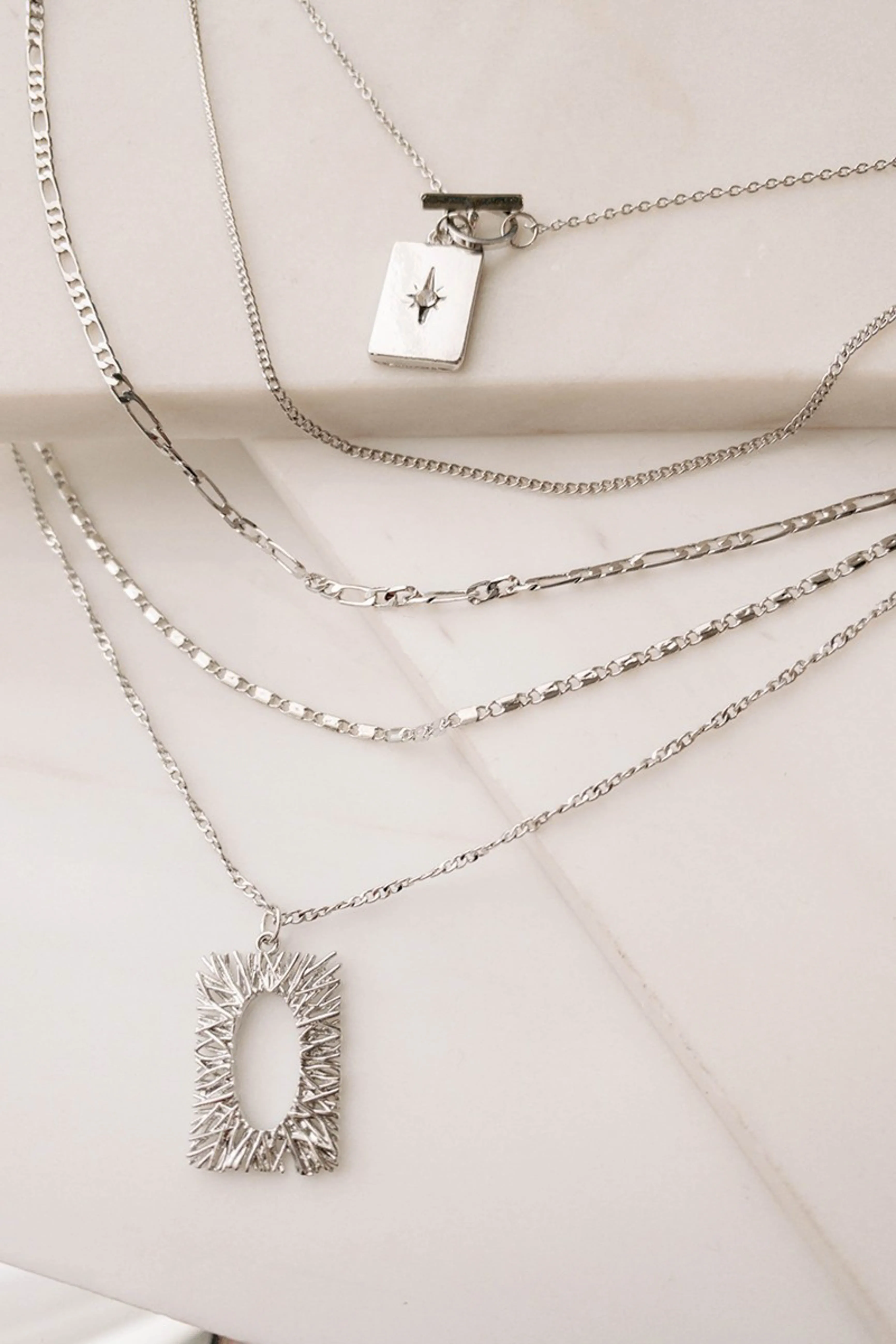 Silver Multilayered Charm Necklace sold by Lime Lush