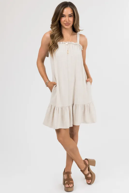 Sand Sleeveless Tie Strap Ruffle Mini Dress sold by Lime Lush