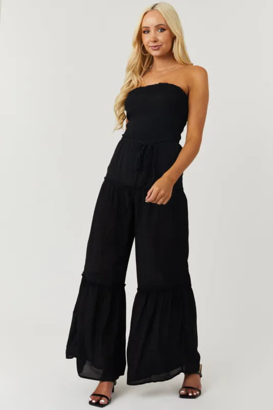 Black Strapless Smocked Jumpsuit with Tie Detail sold by Lime Lush