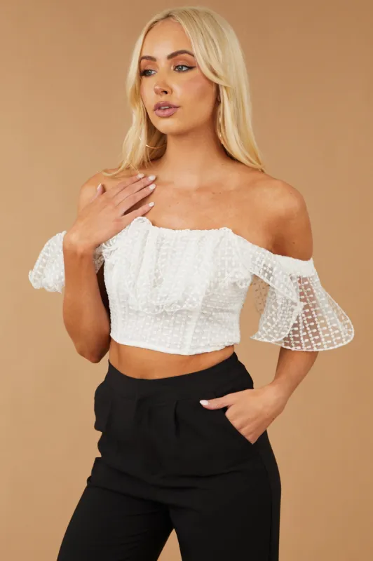 White Embroidery Detail Off Shoulder Ruffle Top sold by Lime Lush
