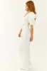 White Denim Jumpsuit with Shell Sleeves sold by Lime Lush