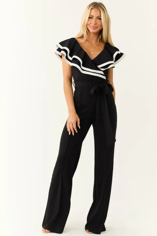 Black Ruffle Jumpsuit with Ivory Contrast Trim sold by Lime Lush