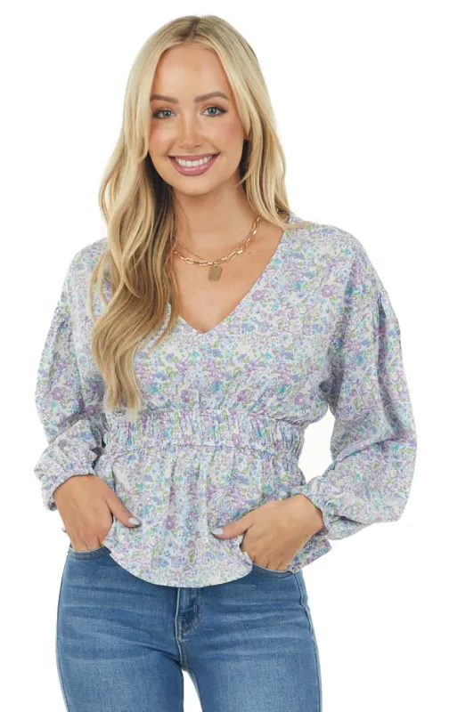 Lilac Floral Smocked Waist V Neckline Top sold by Lime Lush