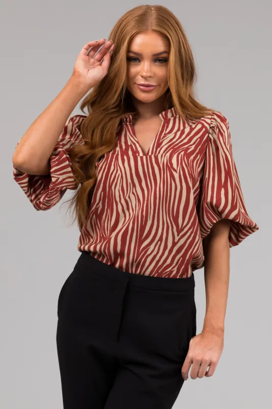 Burgundy and Taupe Zebra Print V Neck Top sold by Lime Lush