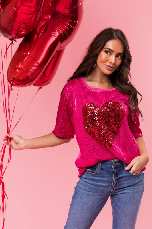 Magenta Sequined Heart Short Sleeve Top sold by Lime Lush