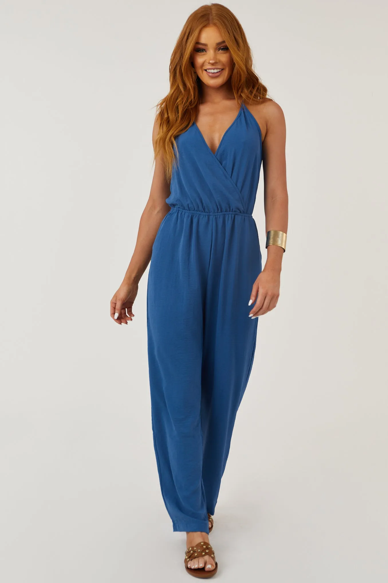 Steel Blue Open Back Jumpsuit with V Neck Tie sold by Lime Lush