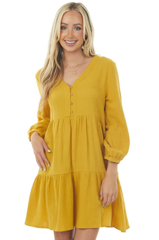 Mustard Long Sleeve V Neck Tiered Woven Short Dress sold by Lime Lush