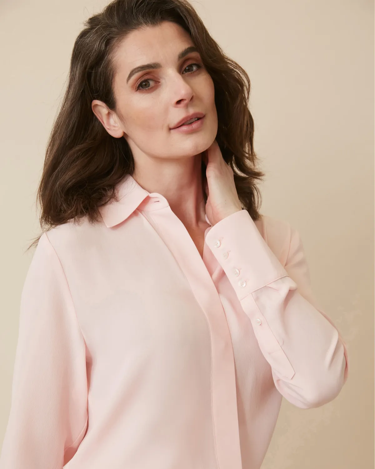 The Simone Button-Up Blouse sold by Numi