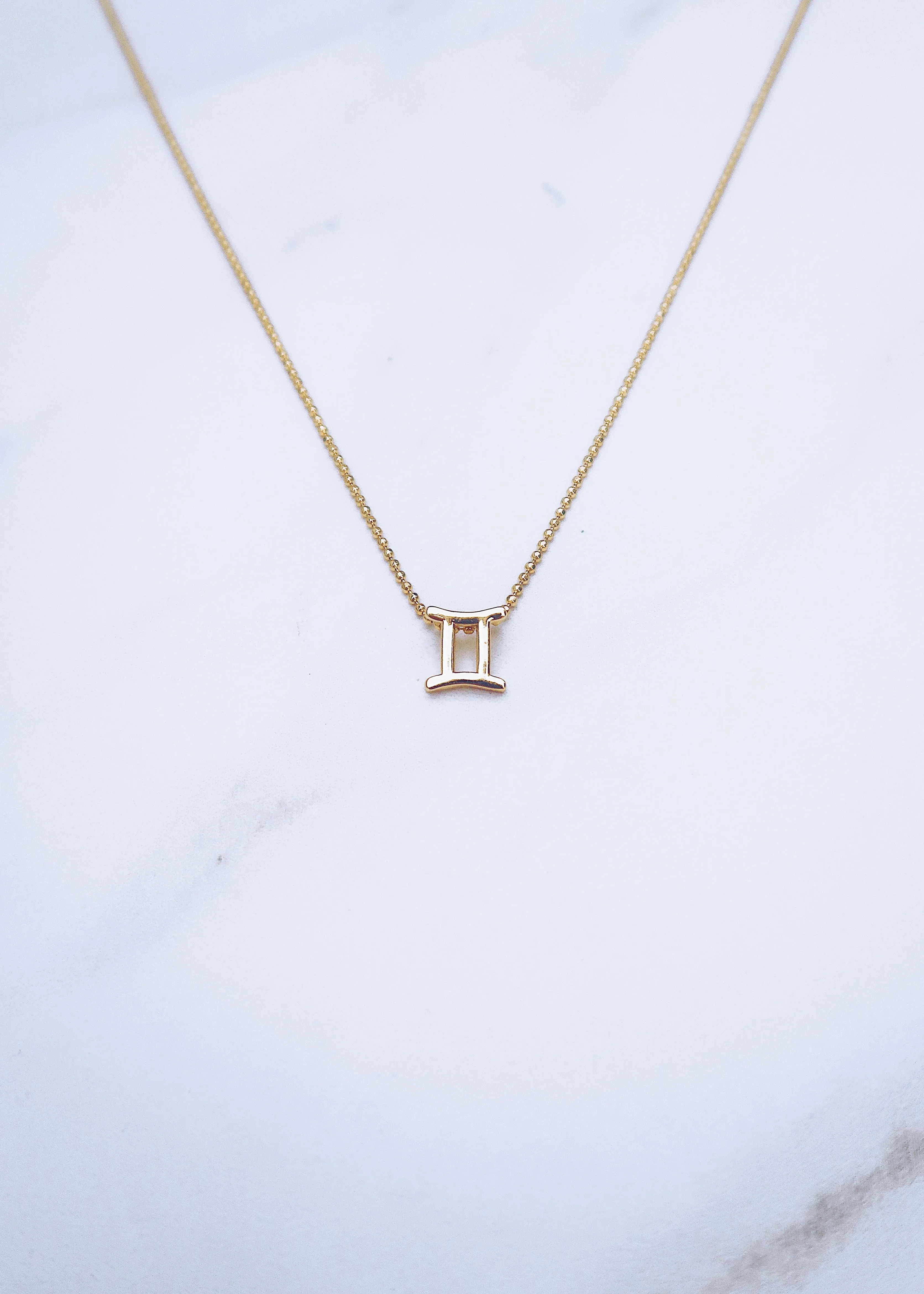 Gemini Zodiac Necklace sold by Ten Wilde