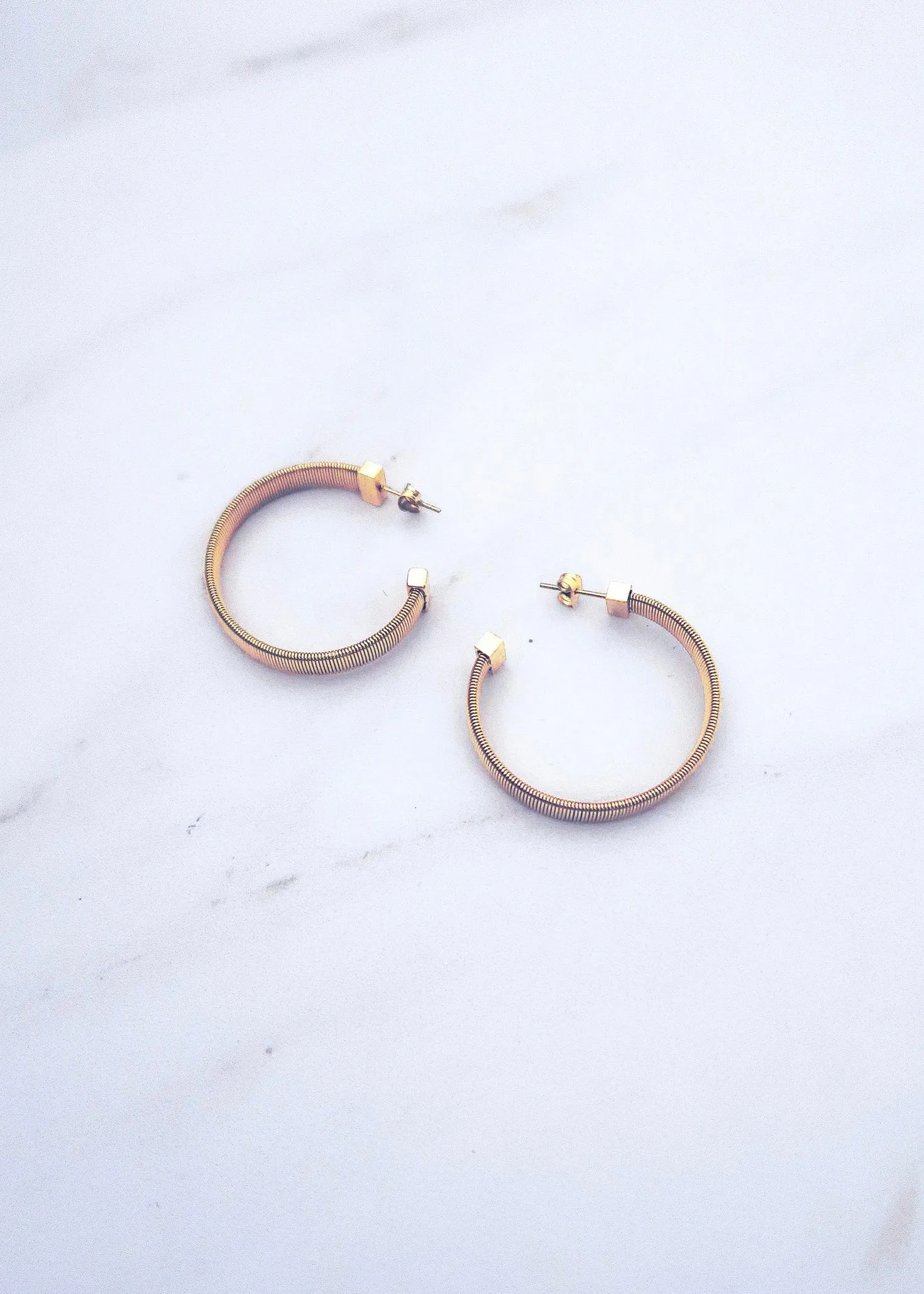 Snake Chain Hoops sold by Ten Wilde