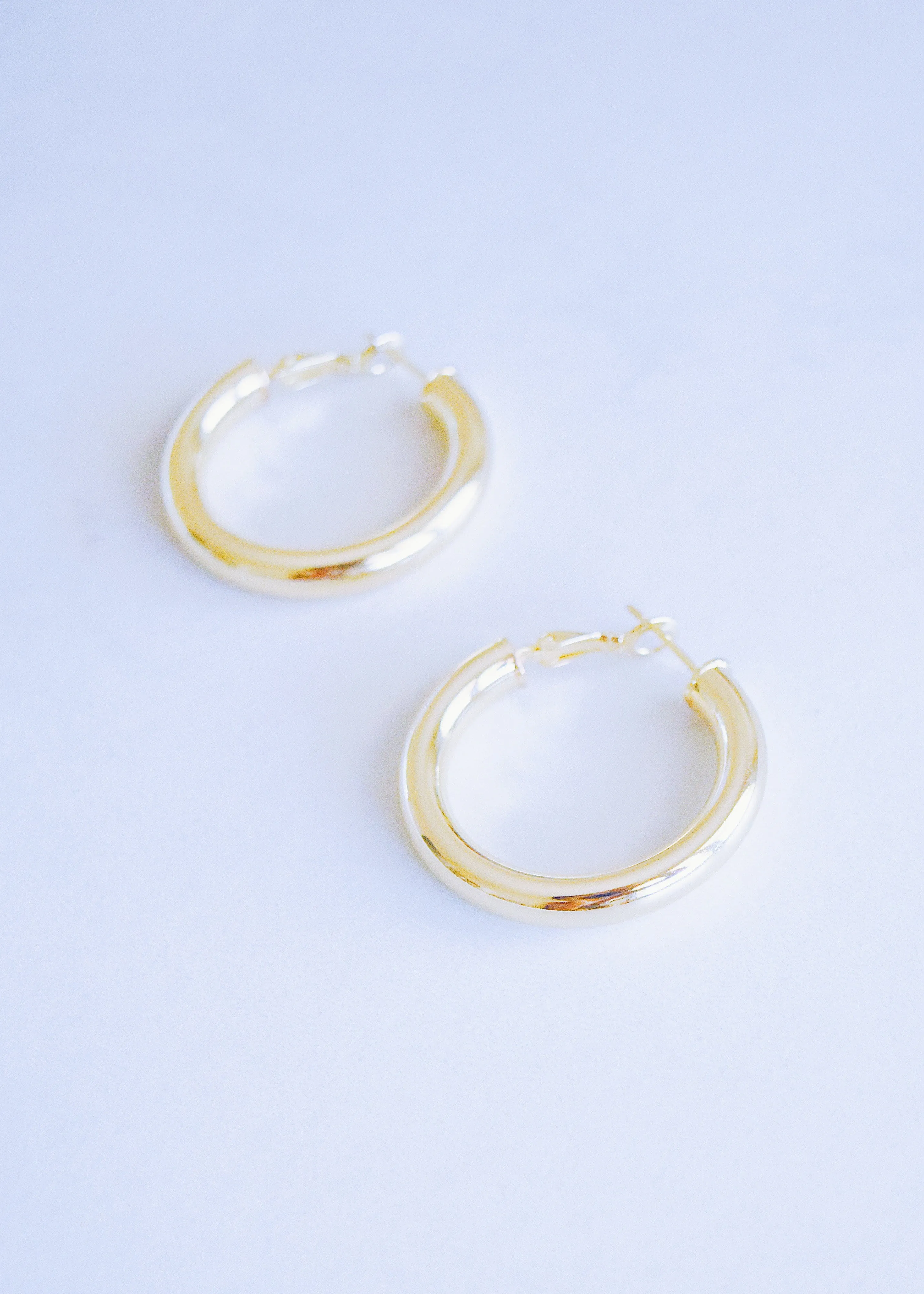 18k Celine Hoops sold by Ten Wilde