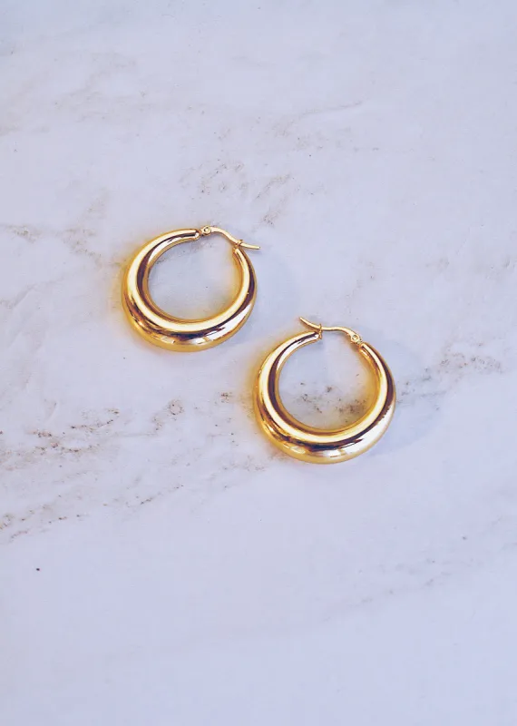 Large Orb Hoops sold by Ten Wilde