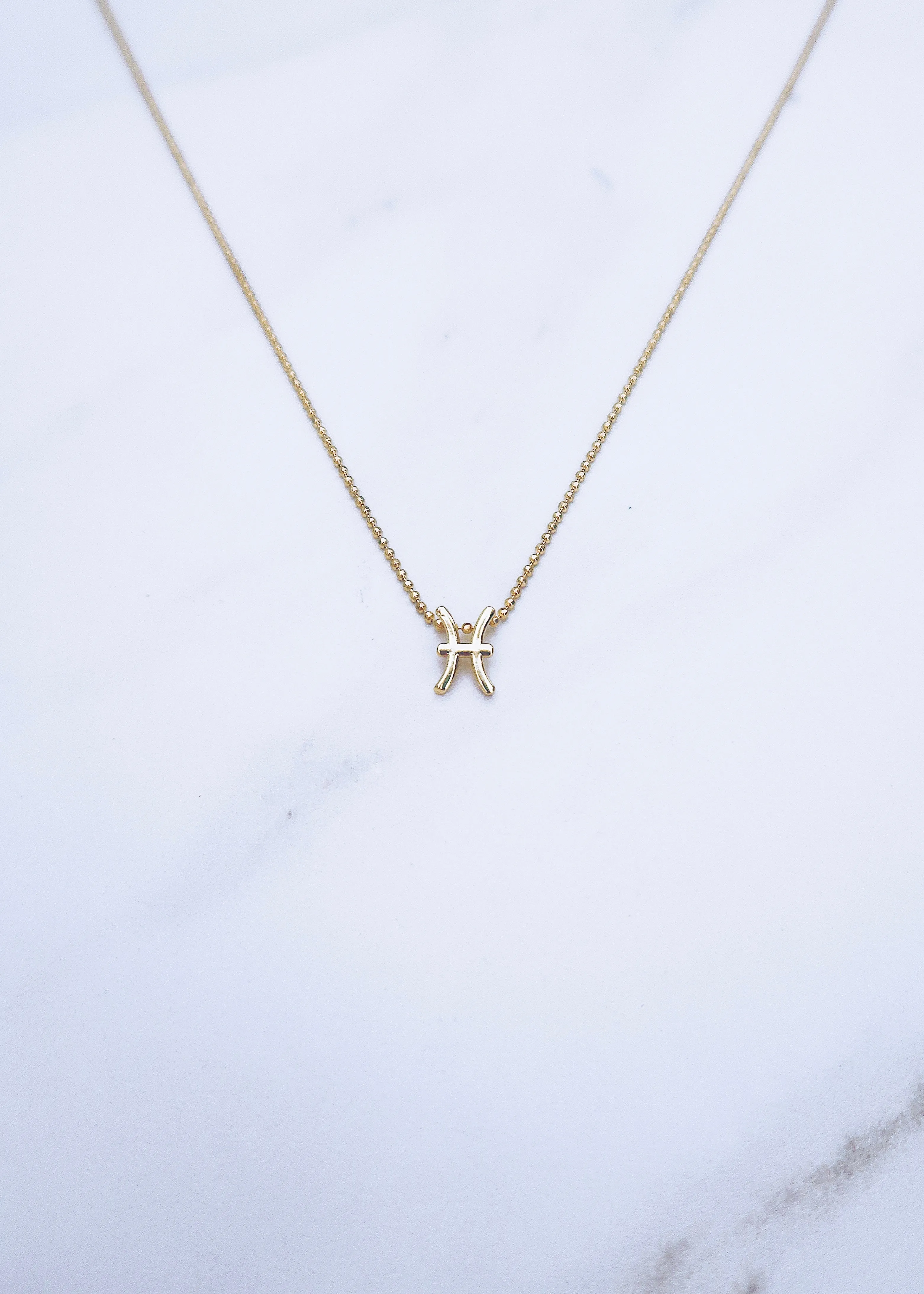 Pisces Zodiac Necklace sold by Ten Wilde