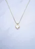 Heart Locket Necklace sold by Ten Wilde