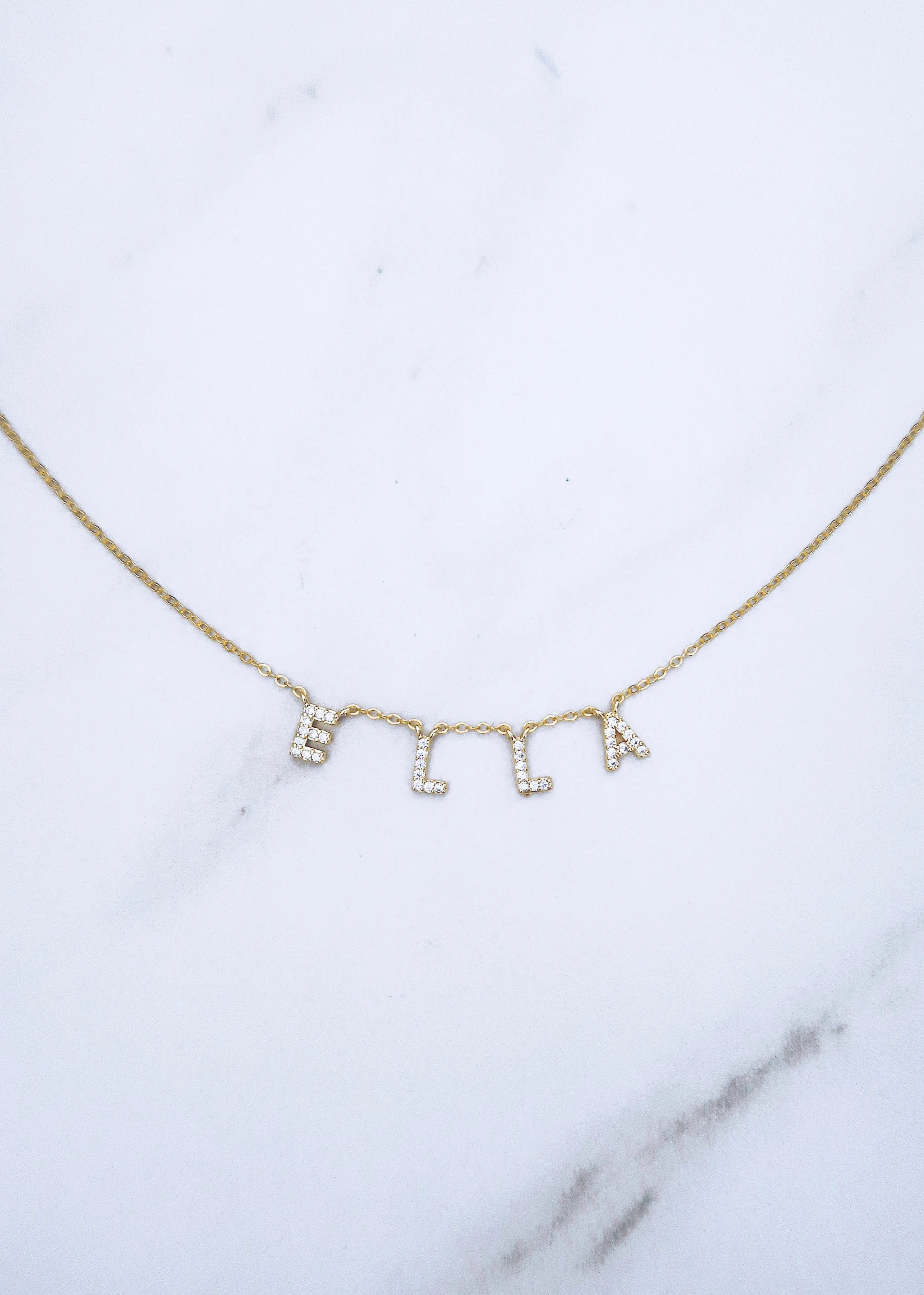 Pave Spaced Letter Necklace sold by Ten Wilde