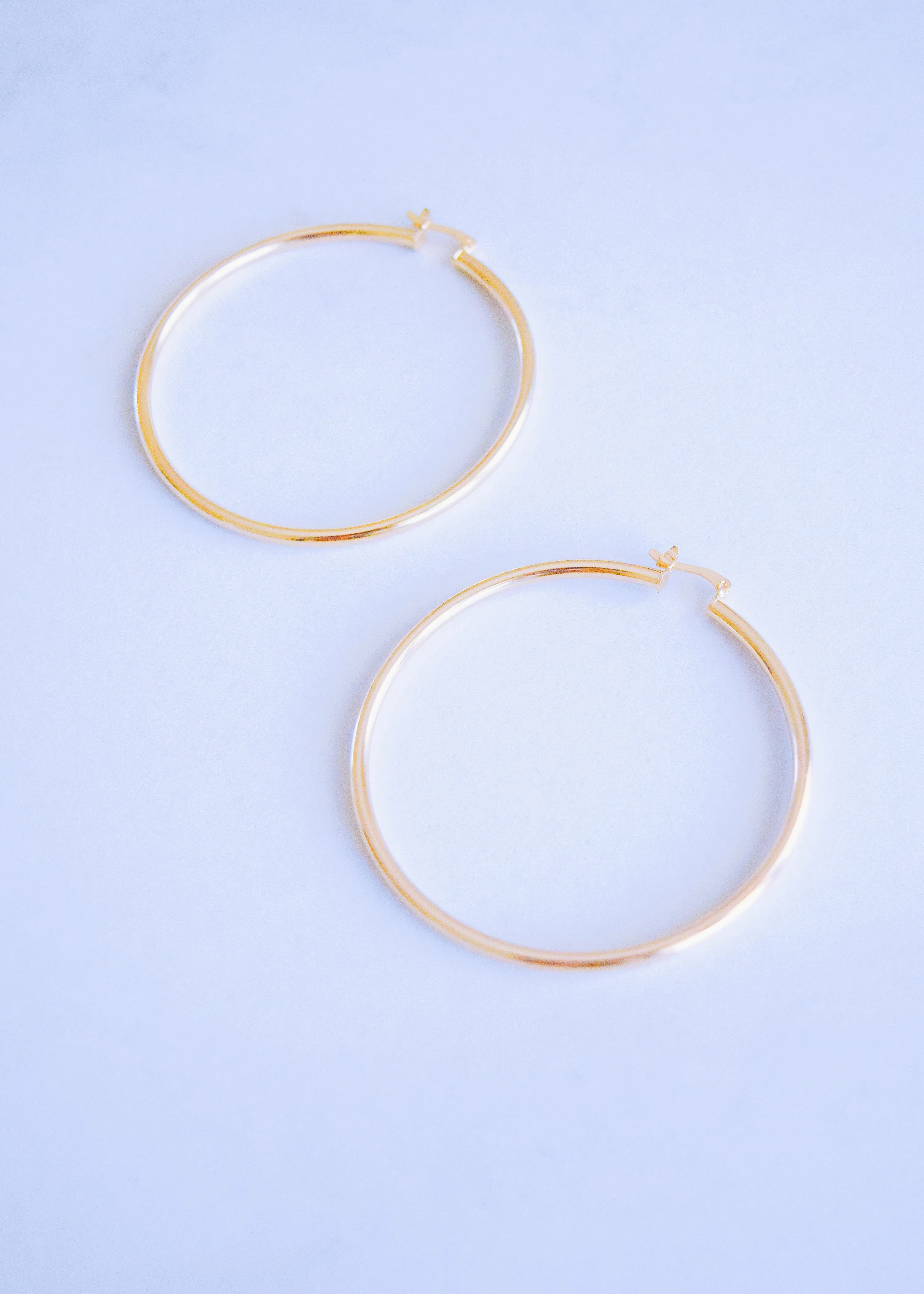 18k Isa Hoops sold by Ten Wilde