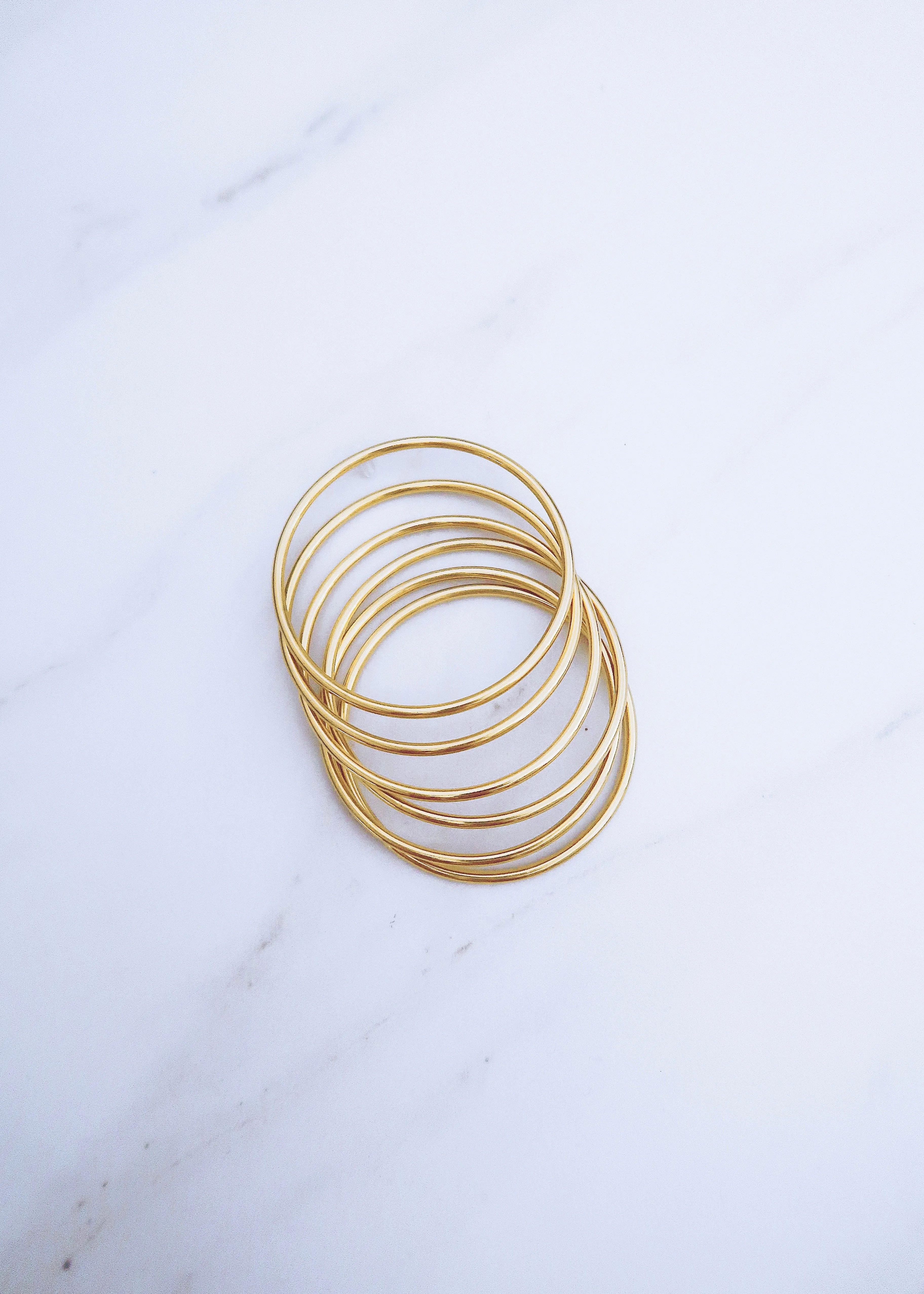 Gold Bangle Set sold by Ten Wilde