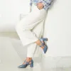 Chloe: Denim Patent Leather sold by Sole Bliss