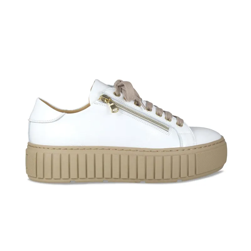 Track: White Patent Leather sold by Sole Bliss