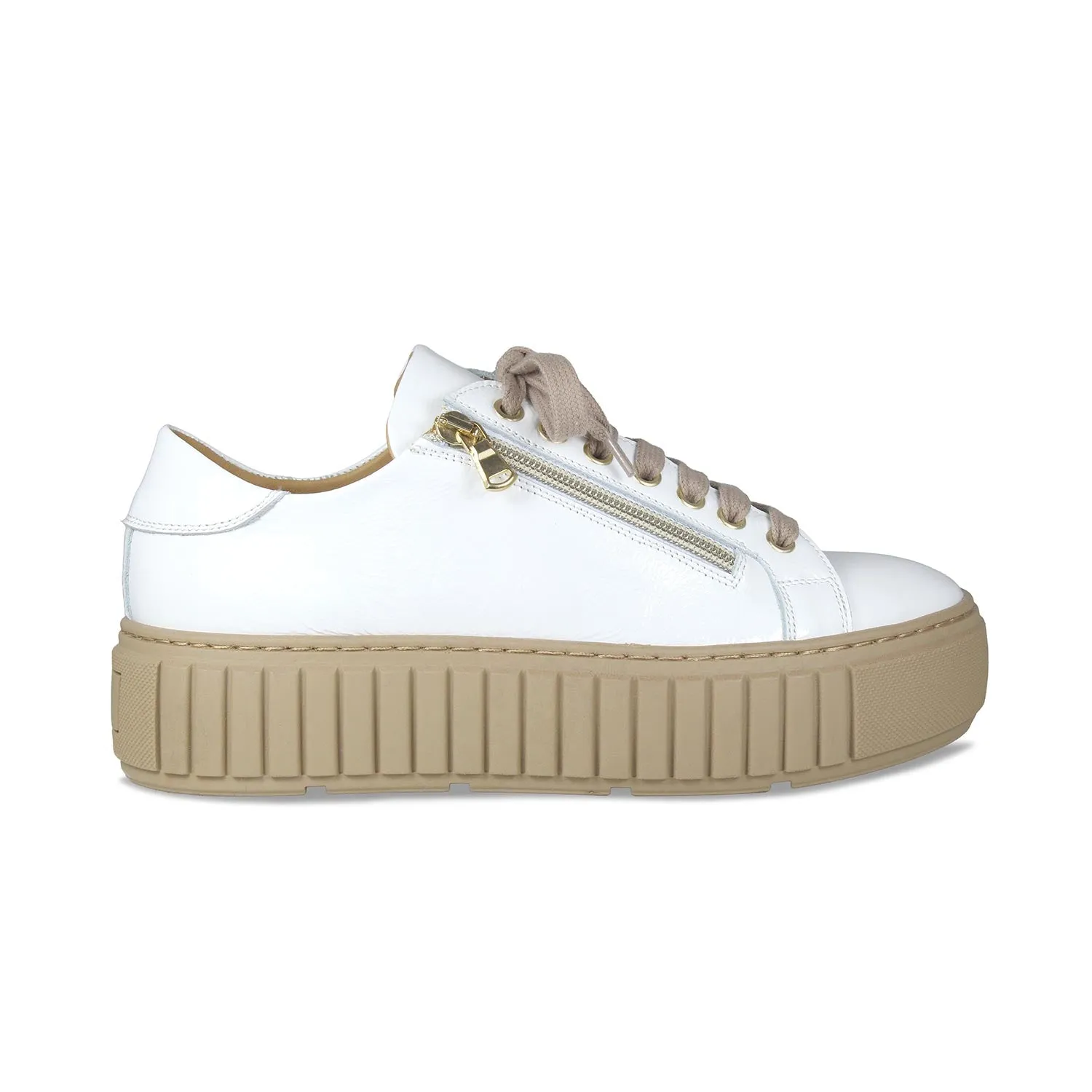 Track: White Patent Leather sold by Sole Bliss