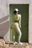 Twist-Front Long Sleeve Crop Top sold by WISKII Active
