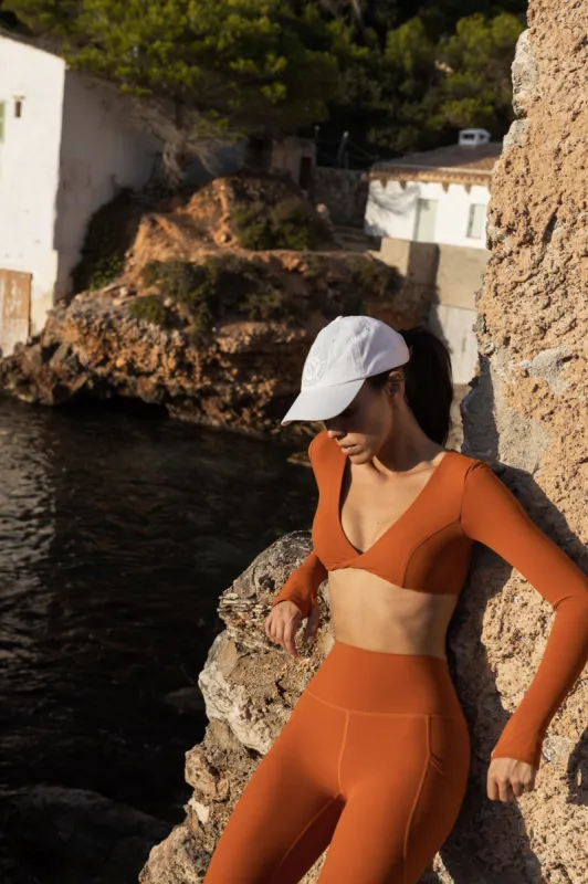 Twist-Front Long Sleeve Crop Top sold by WISKII Active