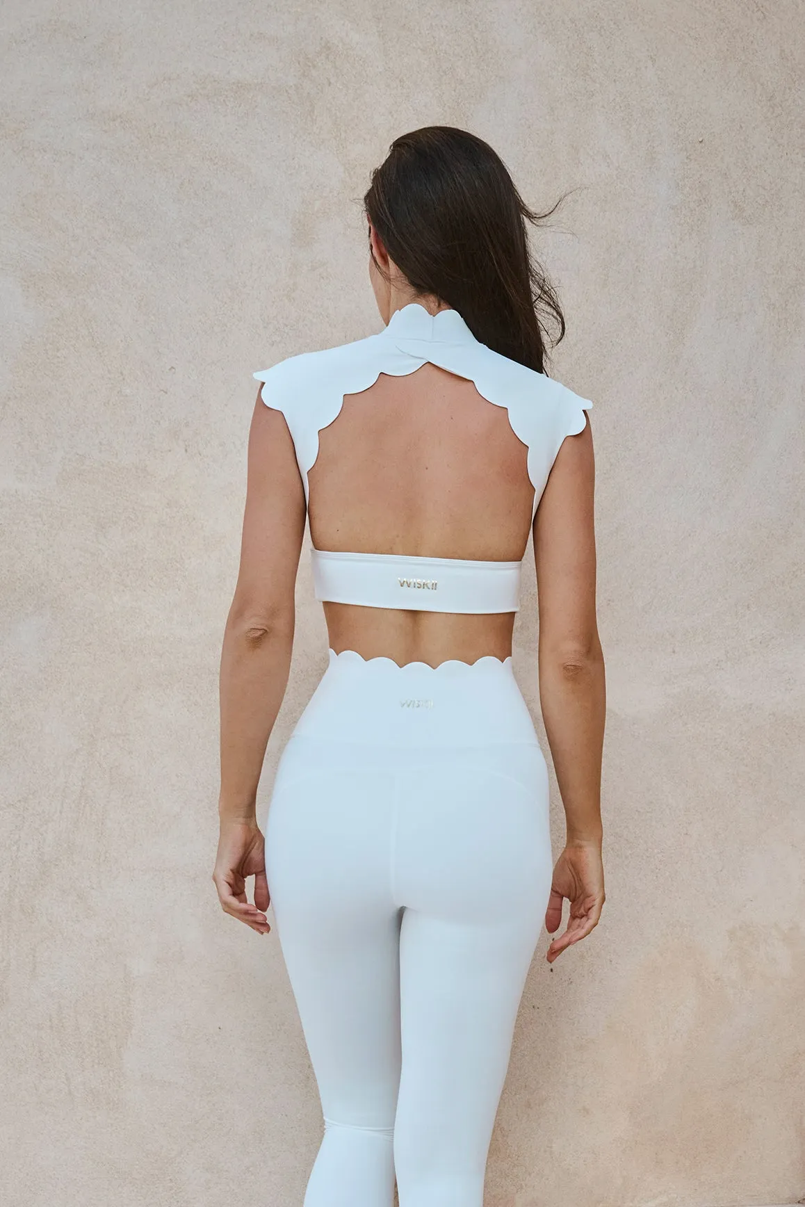 Scallop Cutout Mock Neck Bra sold by WISKII Active