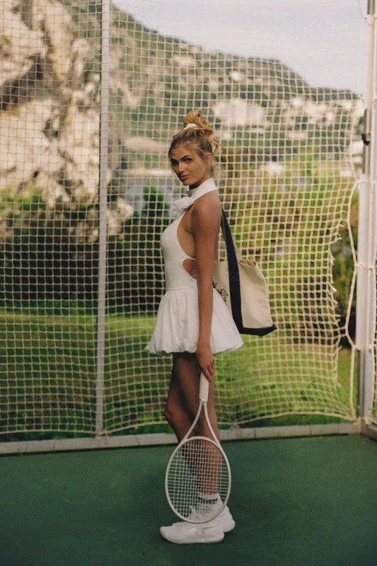 Riviera Floral Halter Mock Neck Dress sold by WISKII Active