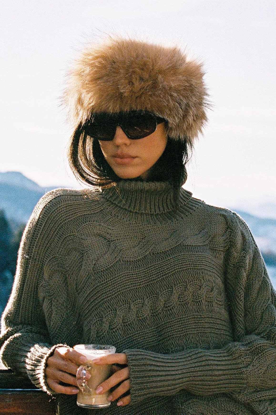 Cable Knit Cape Sweater sold by WISKII Active