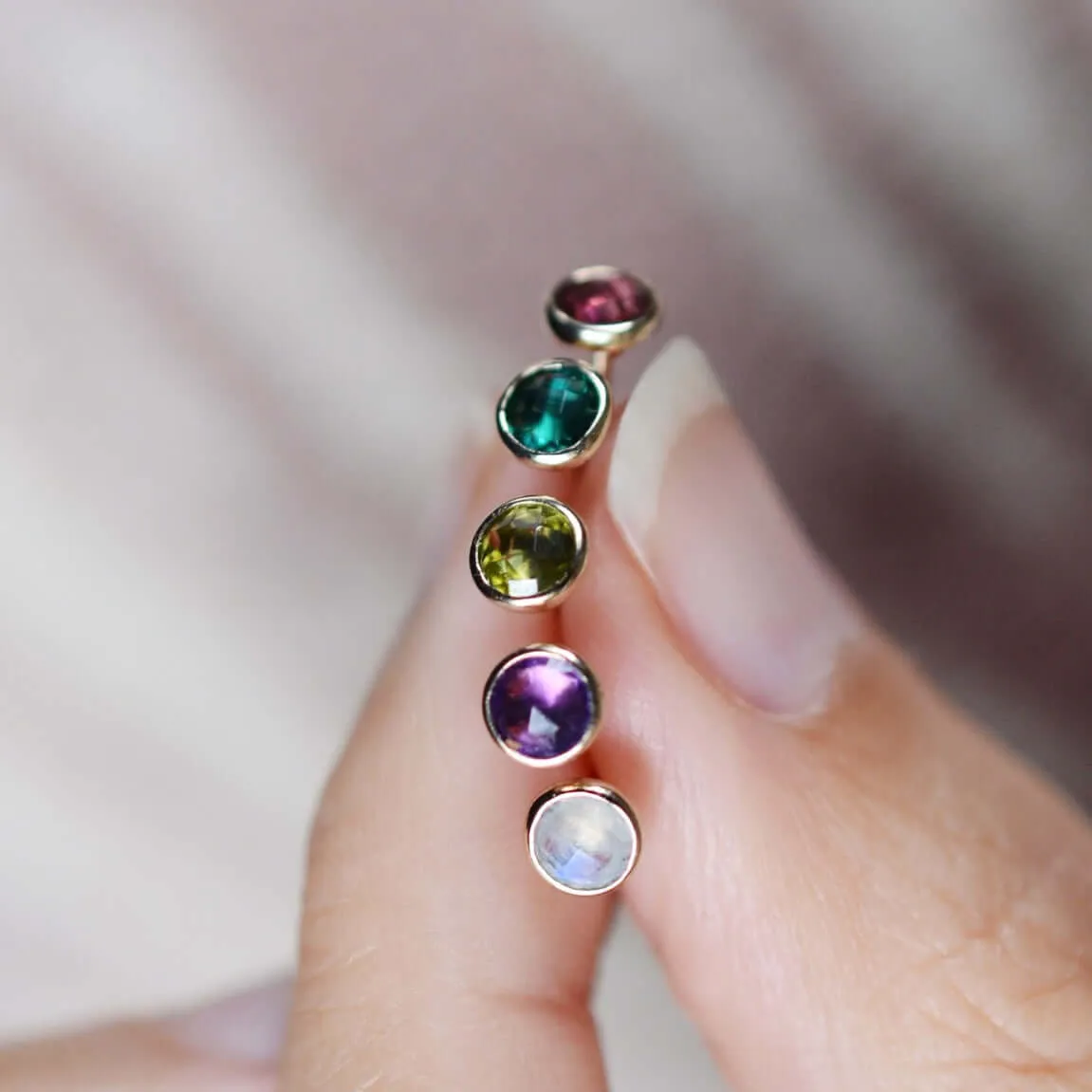 Garnet Birthstone Stud Earrings in 14k Yellow Gold (January) sold by Haverhill product image thumbnail 3