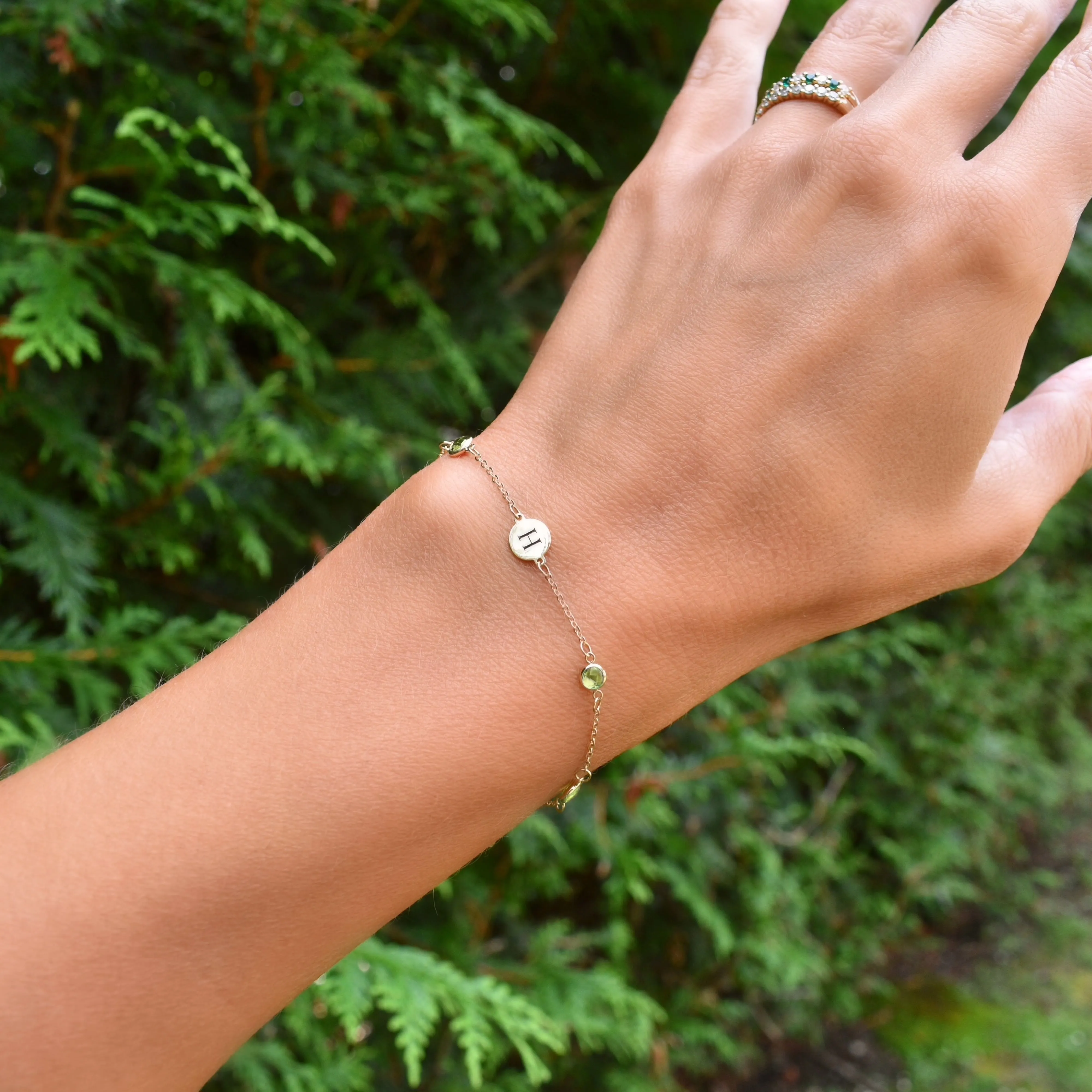 Personalized Classic 1 Letter & 4 Peridot Bracelet in 14k Gold (August) sold by Haverhill product image thumbnail 2