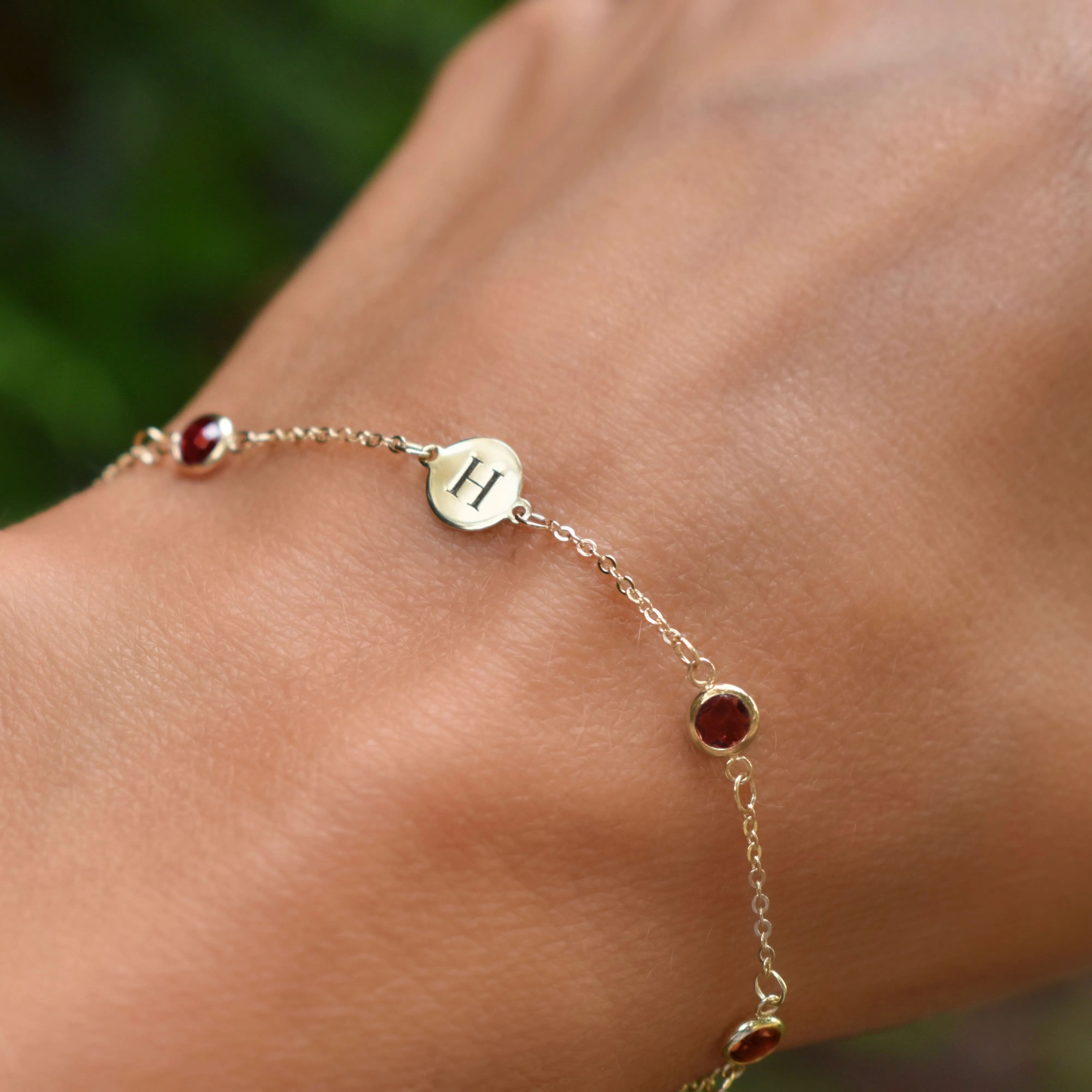 Personalized Classic 1 Letter & 4 Garnet Bracelet in 14k Gold (January) sold by Haverhill product image thumbnail 3