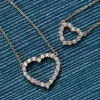 Personalized Rosecliff Heart Birthstone Necklace in 14k Gold sold by Haverhill