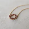 Personalized Rosecliff Small Circle Birthstone Necklace in 14k Gold sold by Haverhill