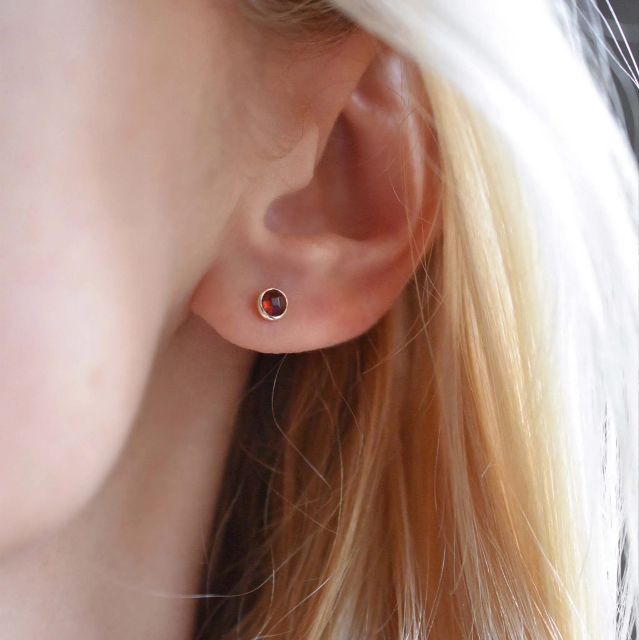 Petite Garnet Stud Earrings in 14k Gold (January) sold by Haverhill product image thumbnail 3