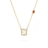 Diamond Clover & Garnet Necklace in 14k Gold (January) sold by Haverhill