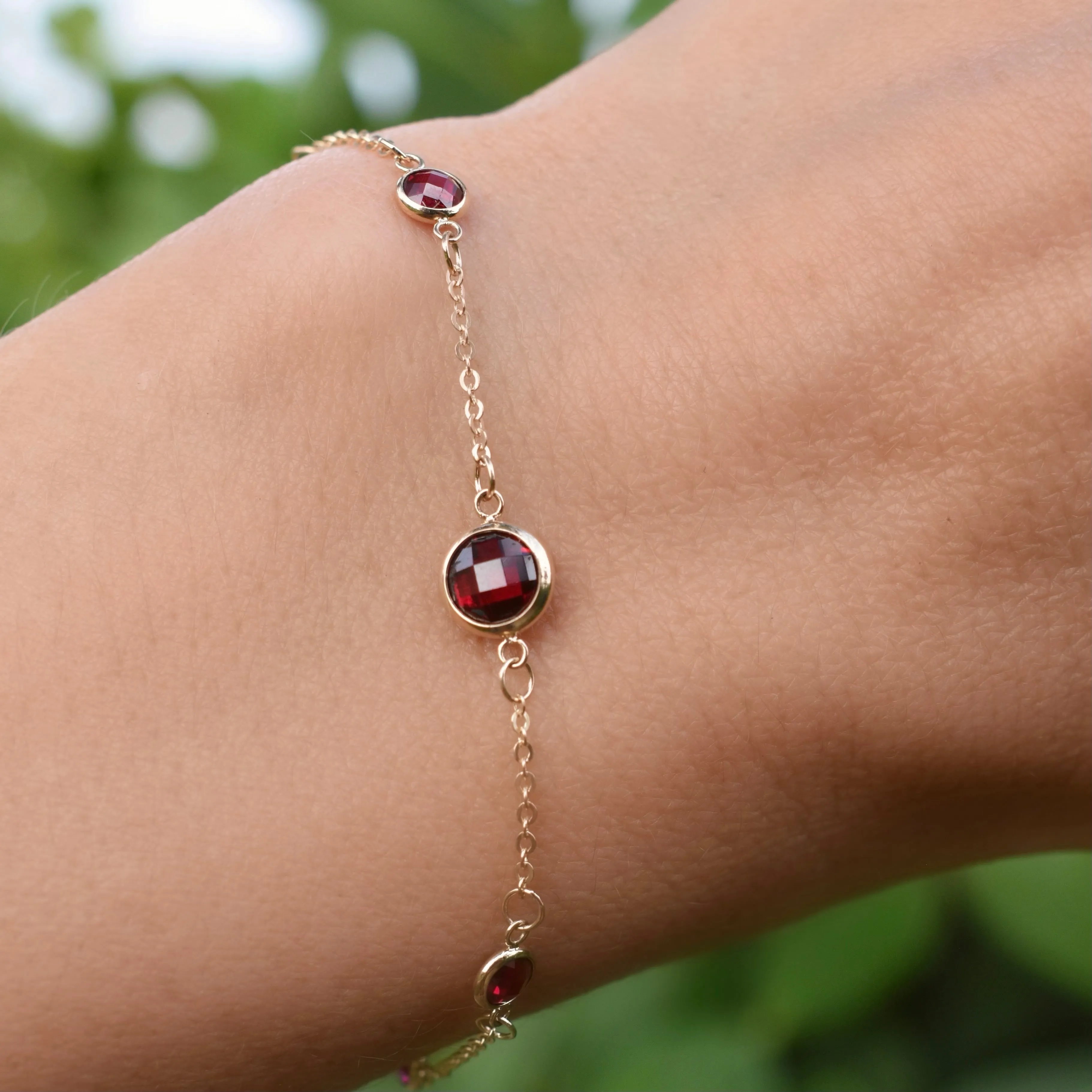 1 Grand & 4 Petite Ruby Bracelet in 14k Gold (July) sold by Haverhill product image thumbnail 3
