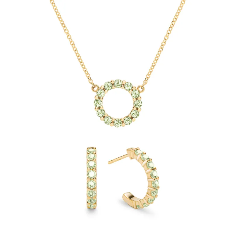 Rosecliff Small Circle Peridot Necklace and Huggie Hoop Earrings Set in 14k Gold (August) sold by Haverhill