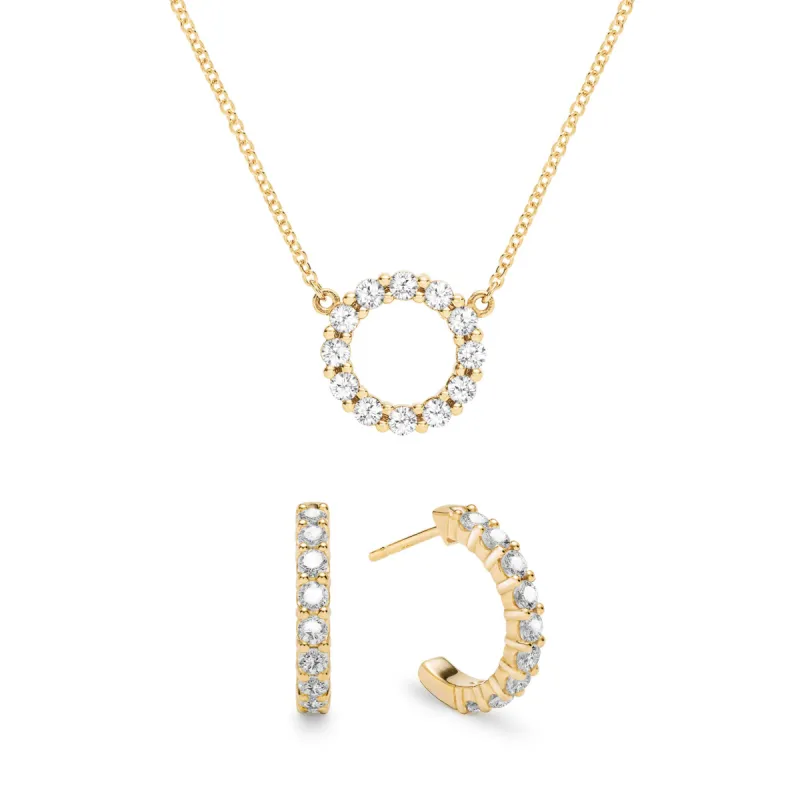 Rosecliff Small Circle White Topaz Necklace and Huggie Hoop Earrings Set in 14k Gold (April) sold by Haverhill