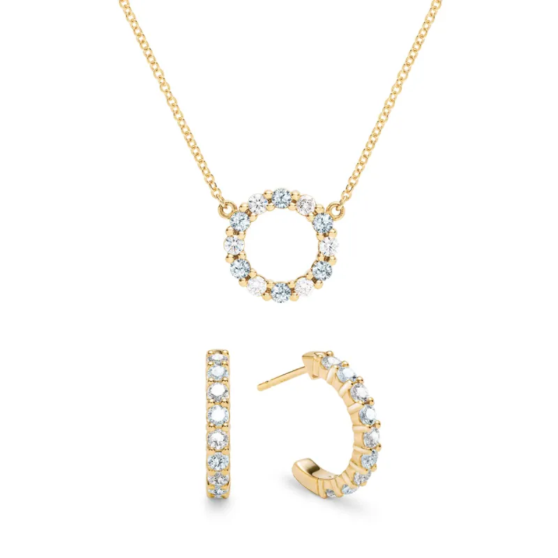 Rosecliff Small Circle Diamond & Aquamarine Necklace and Huggie Hoop Earrings Set in 14k Gold (March) sold by Haverhill