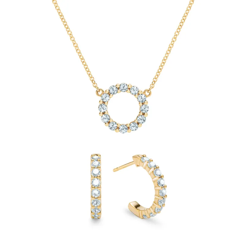 Rosecliff Small Circle Aquamarine Necklace and Huggie Hoop Earrings Set in 14k Gold (March) sold by Haverhill