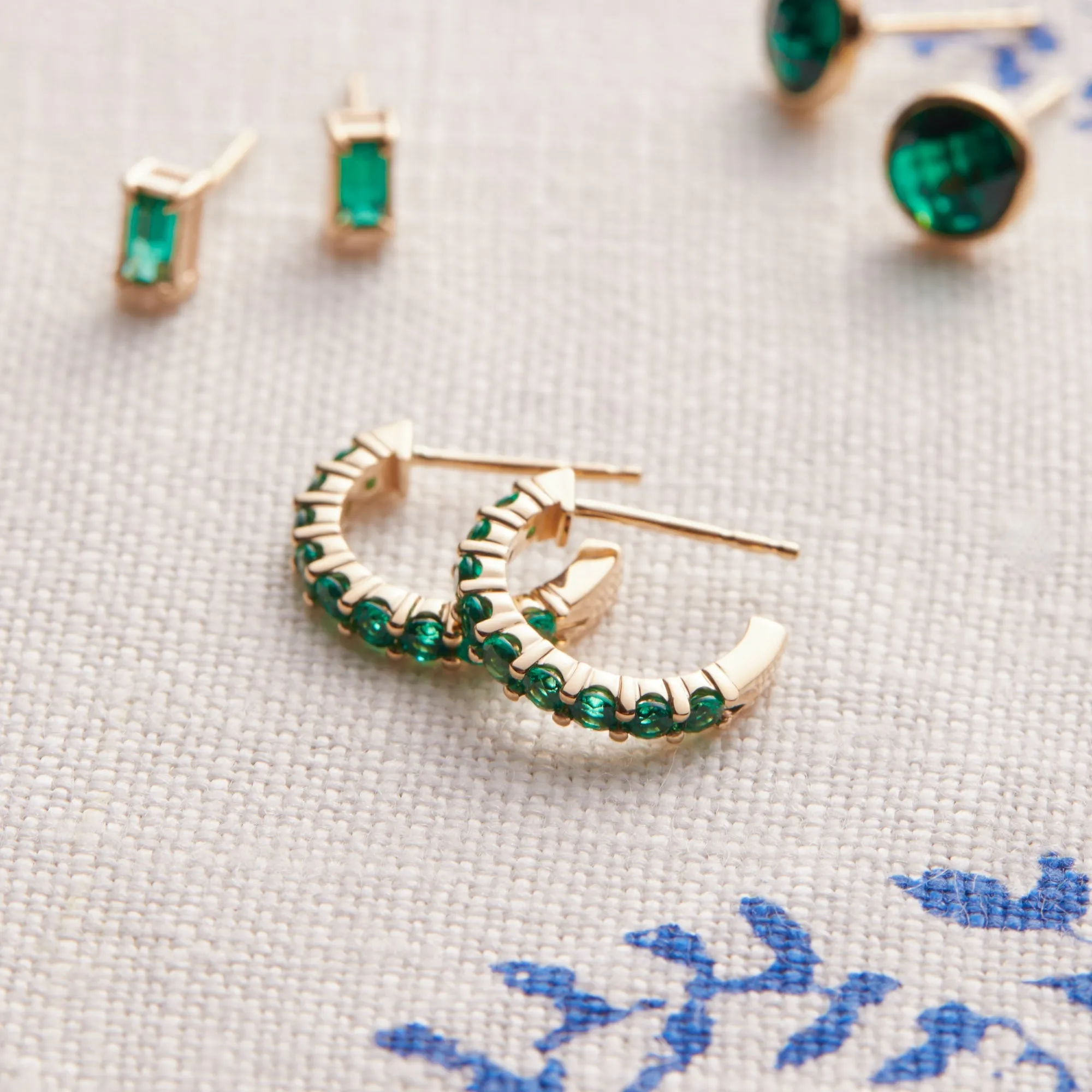 Rosecliff Emerald Huggie Hoop Earrings in 14k Gold (May) sold by Haverhill product image thumbnail 3