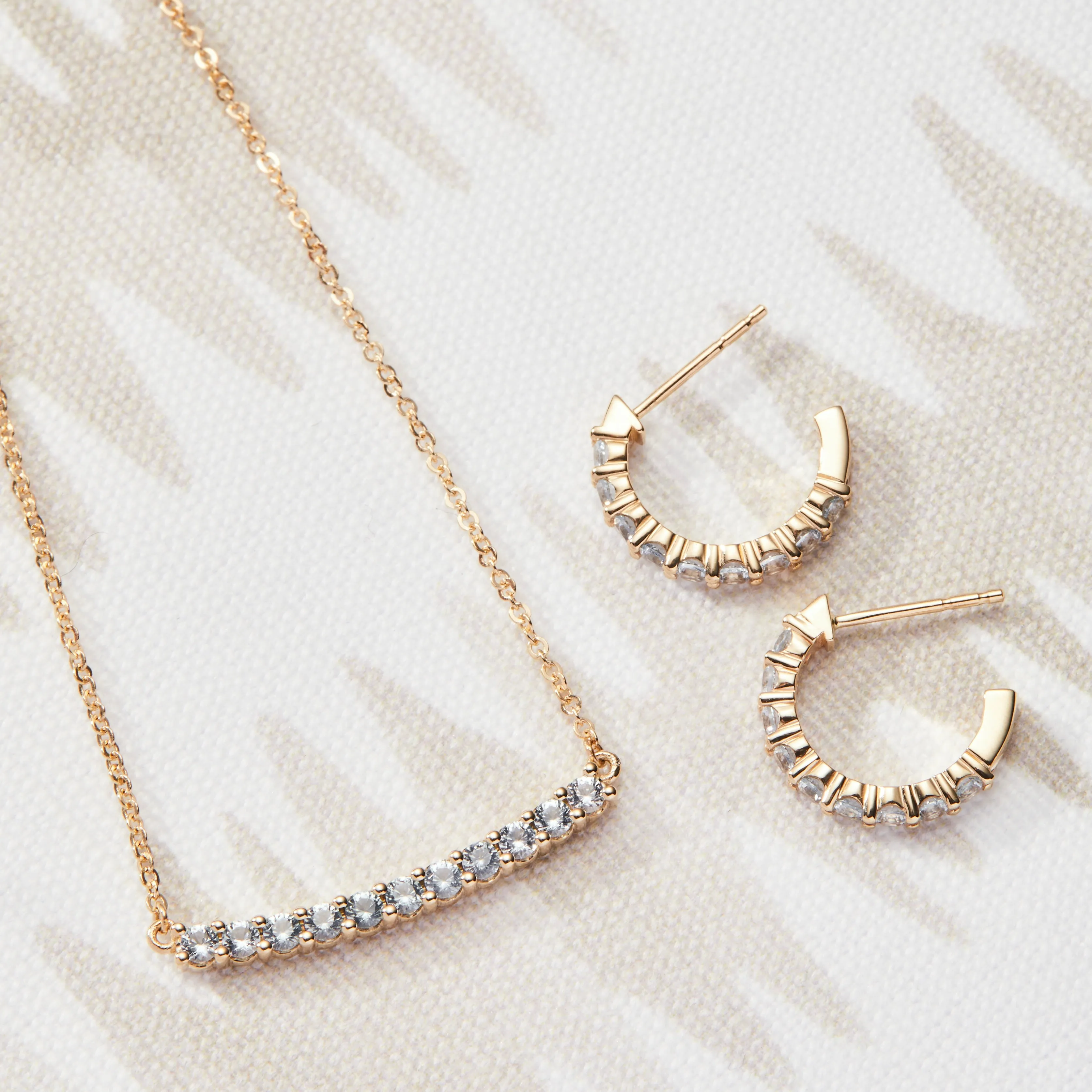 Rosecliff Aquamarine Huggie Hoop Earrings in 14k Gold (March) sold by Haverhill product image thumbnail 3