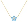 Greenwich Flower Nantucket Blue Topaz & Diamond Necklace in 14k Gold (December) sold by Haverhill