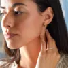 Rosecliff Opal Huggie Hoop Earrings in 14k Gold (October) sold by Haverhill