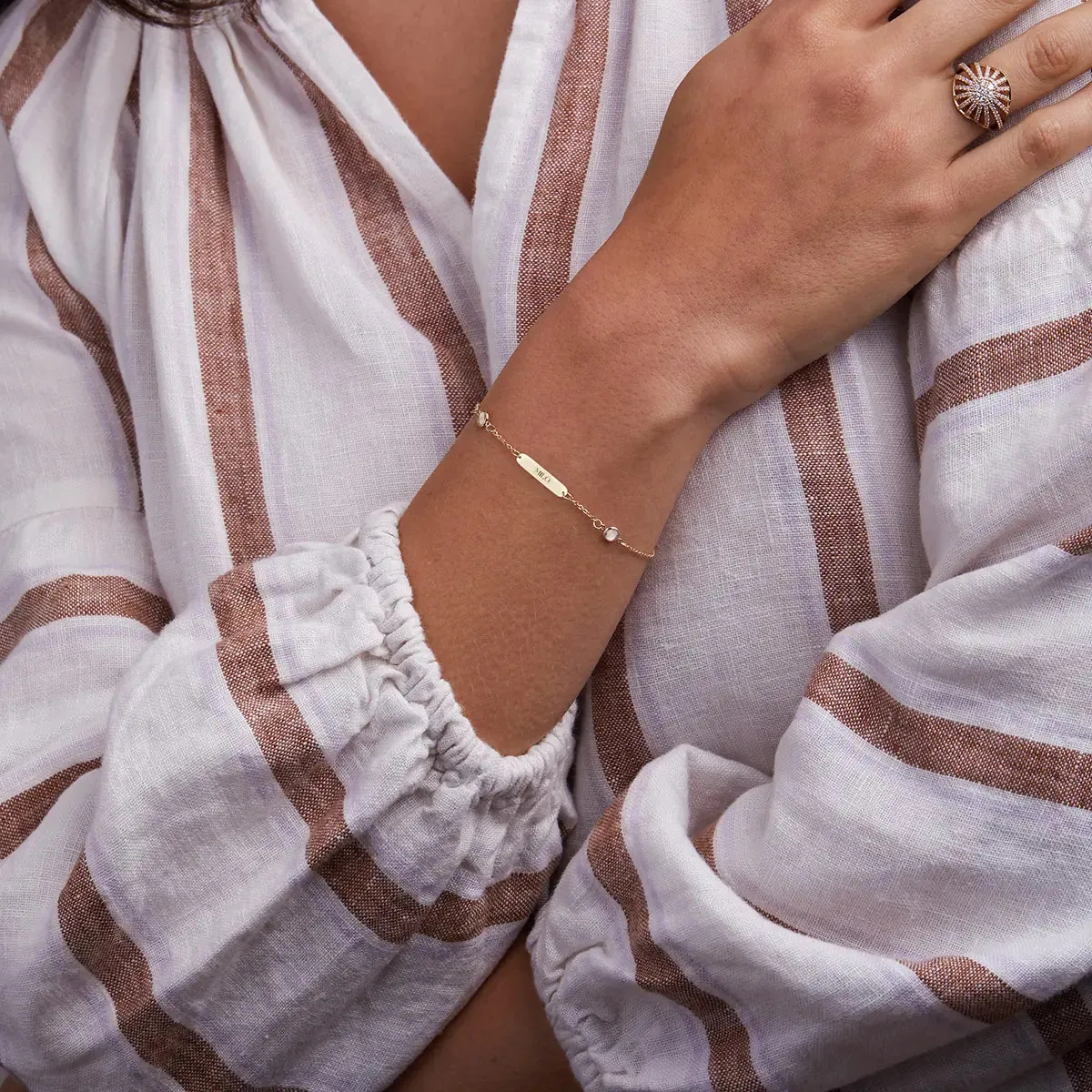 1 Nameplate & 6 Petite White Topaz Bracelet in 14k Gold (April) sold by Haverhill product image thumbnail 2