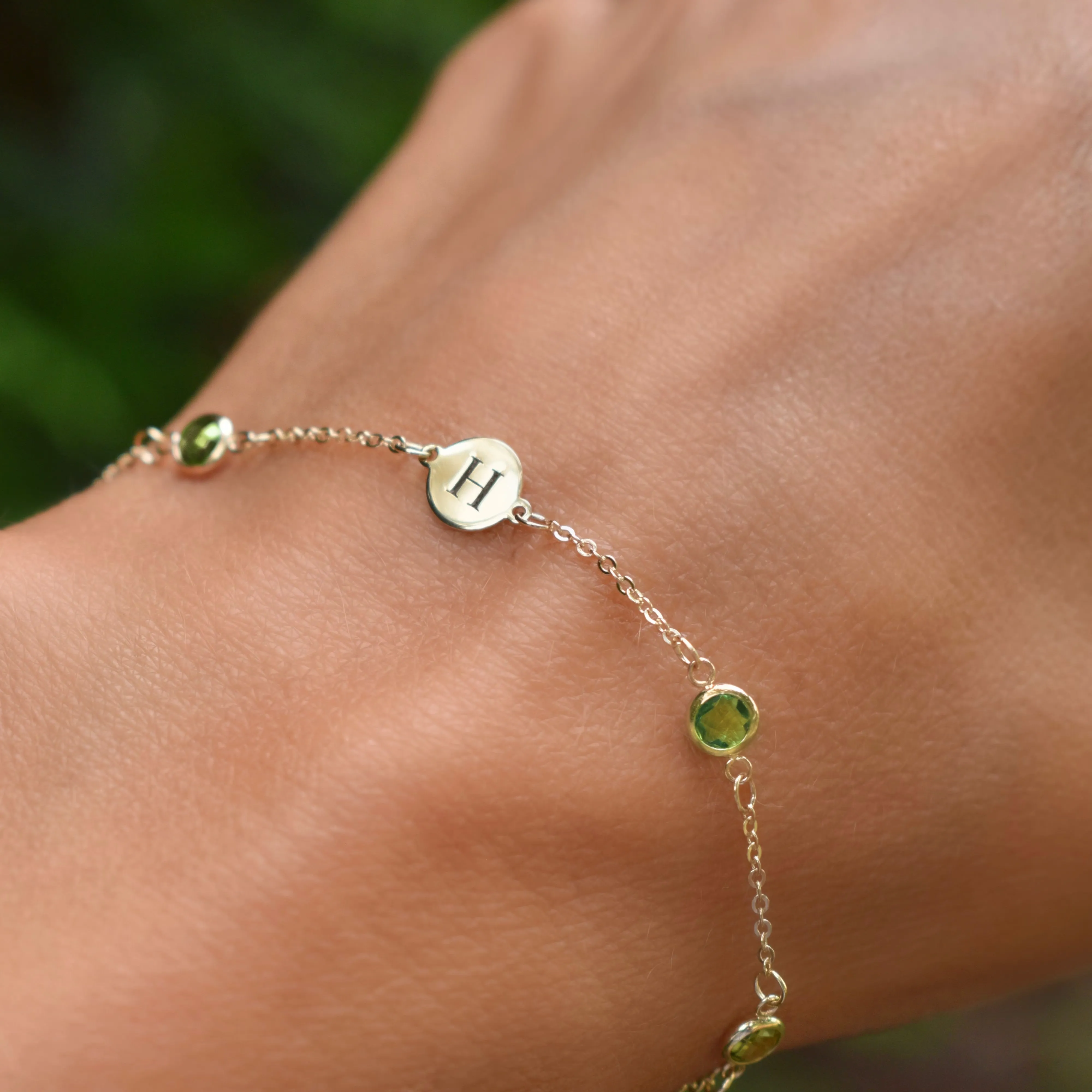 Personalized Classic 1 Letter & 4 Peridot Bracelet in 14k Gold (August) sold by Haverhill product image thumbnail 3