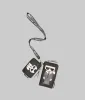 KARL AND CHOUPETTE POUCH LANYARD sold by Karl Lagerfeld Paris