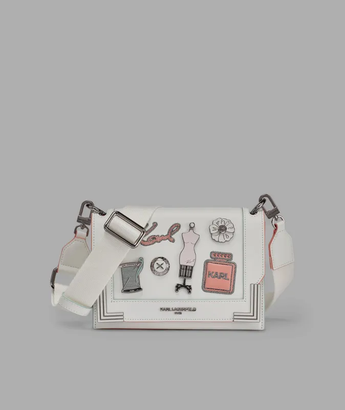 CAMILLE SHOULDER WITH OVERSIZED FASHION PINS sold by Karl Lagerfeld Paris